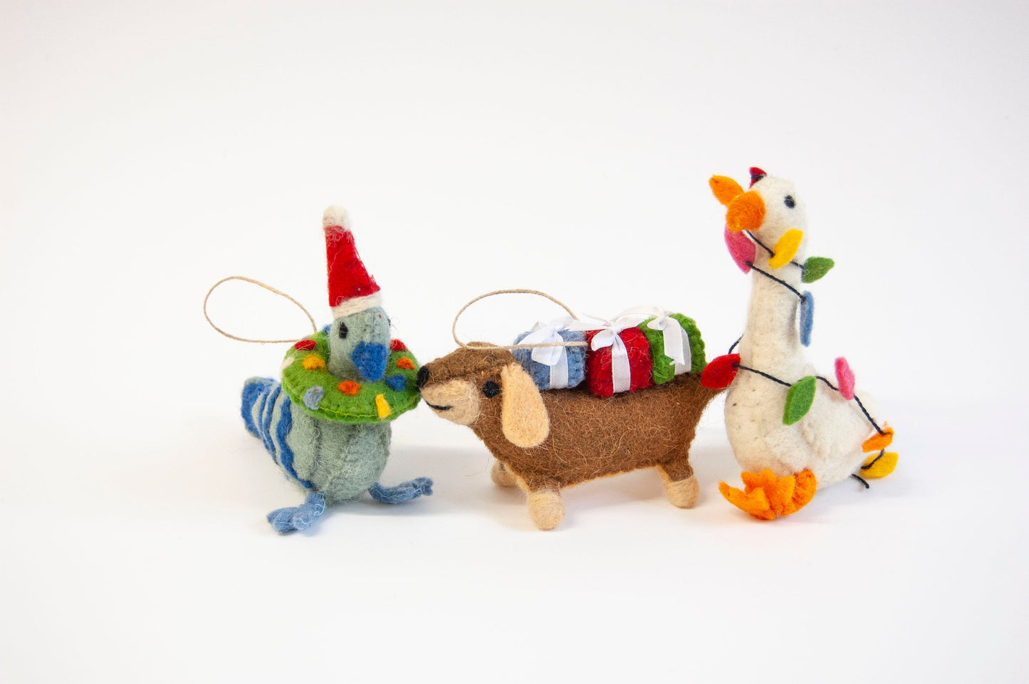 Three festive felt animal ornaments on a white background - ZWEIBIE