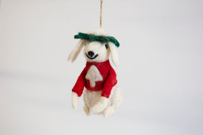 Decorative poodle ornament with a red scarf and green leaf hat on a white background - ZWEIBIE